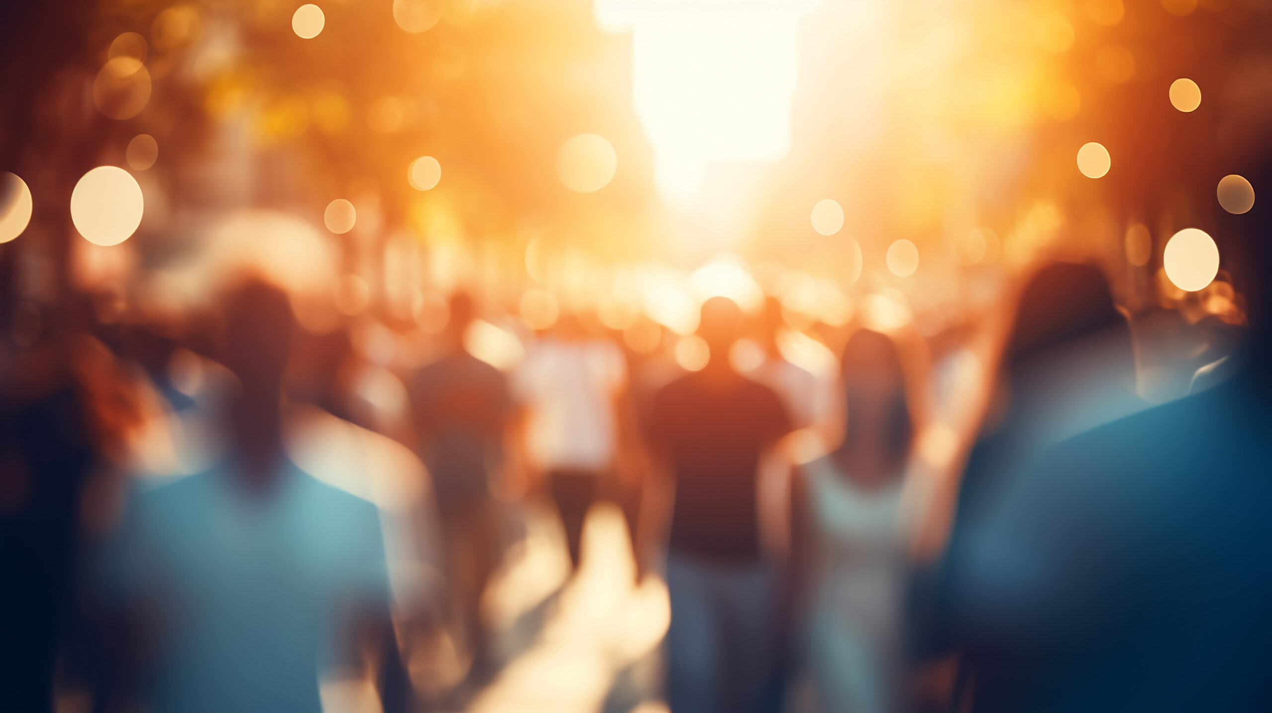 crowd of people on a sunny summer street blurred abstract background in out-of-focus, sun glare image light